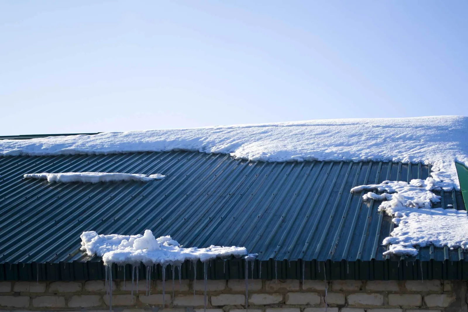 Commercial Snow and Ice Roof Damage Repair in Plano, TX